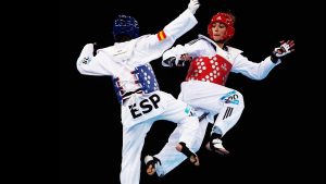 Taekwondo athletes wore socks and clothing fitted with electronic sensors which registered a blow when contact is made